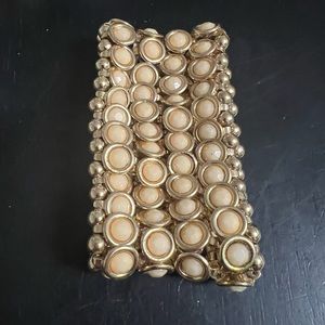 ONE PRE-OWNED 2”WIDE GOLDTONE STRETCH BRACELET WITH CREAM COLORED BEADS CTM1